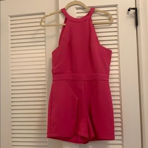 Pink JOA romper with open back